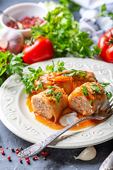 Image showing Cabbage rolls stuffed with ground beef and rice.