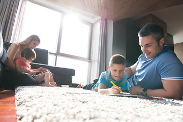 Image showing young couple spending time with kids