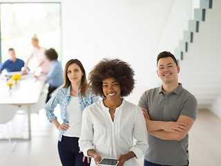 Image showing Multiethnic startup Business Team At A Meeting at modern office 