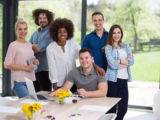 Image showing Multiethnic startup Business Team At A Meeting at modern office 