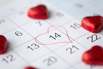 Image showing close up of calendar and heart shaped candies