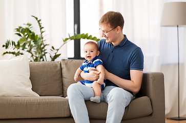 Image showing happy father with baby son at home