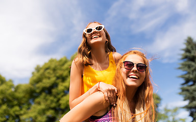 Image showing happy teenage girls having fun at summer park