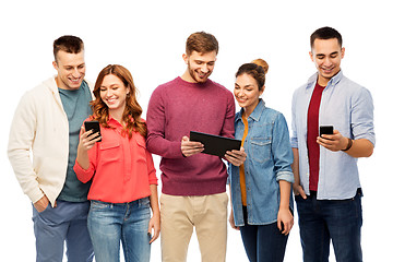 Image showing friends with smartphones and tablet computer