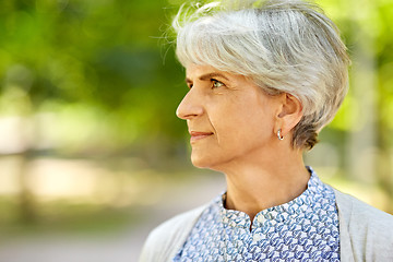 Image showing portrait of senior woman at summer park