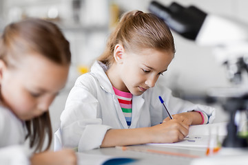 Image showing kids studying chemistry at school laboratory