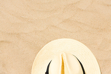 Image showing straw hat on beach sand