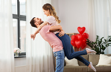 Image showing happy couple at home on valentines day