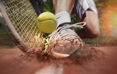 Image showing Tennis player on clay tennis court