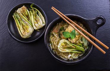 Image showing Thai green curry chicken soup with pak choi