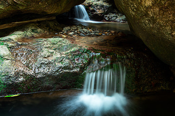 Image showing Waterfall flow through cavern