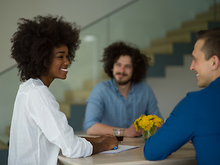 Image showing Multiethnic startup Business Team At A Meeting at modern office 