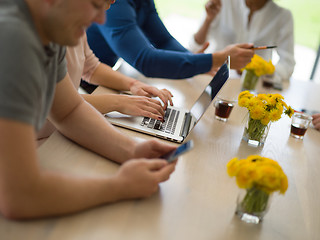 Image showing Multiethnic startup Business Team At A Meeting at modern office 