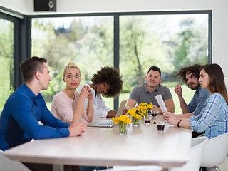 Image showing Multiethnic startup Business Team At A Meeting at modern office 