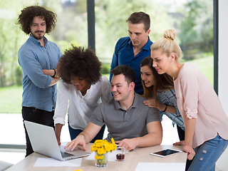 Image showing Multiethnic startup Business Team At A Meeting at modern office 