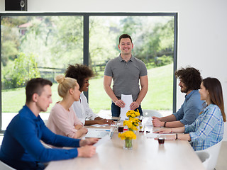 Image showing Multiethnic startup Business Team At A Meeting at modern office 