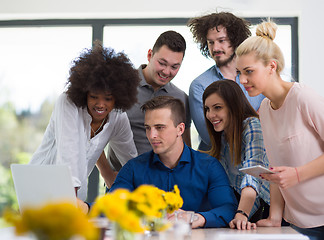 Image showing Multiethnic startup Business Team At A Meeting at modern office 