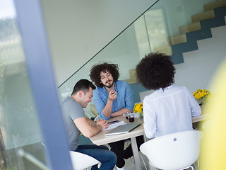 Image showing Multiethnic startup Business Team At A Meeting at modern office 