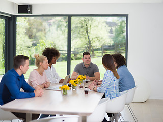 Image showing Multiethnic startup Business Team At A Meeting at modern office 