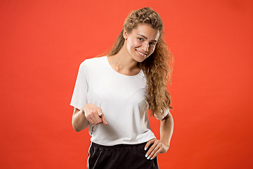 Image showing The happy business woman point you and want you, half length closeup portrait