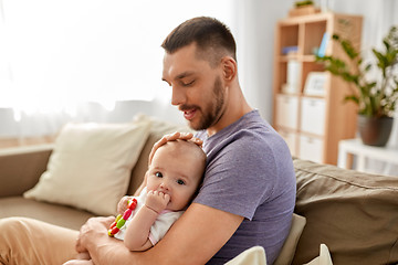 Image showing happy father with little baby daughter at home