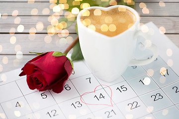 Image showing close up of calendar, heart, coffee and red rose