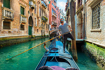 Image showing Gondolier with a paddle