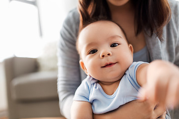 Image showing close up of asian baby boy with mother