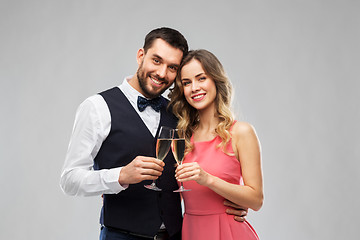 Image showing happy couple with champagne glasses toasting