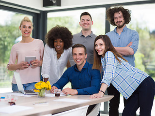 Image showing Multiethnic startup Business Team At A Meeting at modern office 