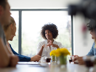 Image showing Multiethnic startup Business Team At A Meeting at modern office 