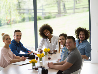 Image showing Multiethnic startup Business Team At A Meeting at modern office 