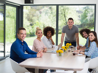 Image showing Multiethnic startup Business Team At A Meeting at modern office 