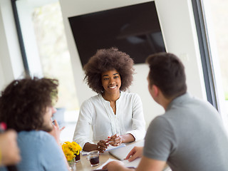 Image showing Multiethnic startup Business Team At A Meeting at modern office 