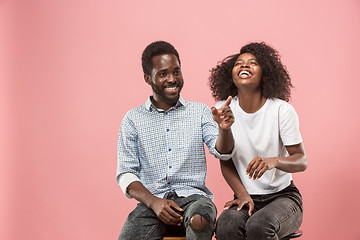 Image showing Couple watching sports match on tv at home, celebrating victory, successful game