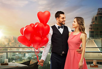 Image showing couple with heart shaped balloons in singapore