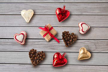 Image showing christmas gift and heart shaped decorations