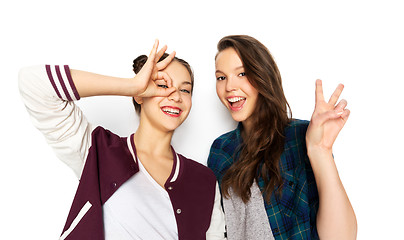 Image showing happy smiling teenage girls making gestures