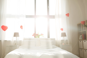 Image showing cozy bedroom decorated for valentines day