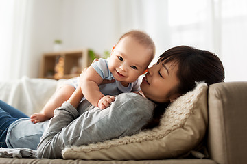 Image showing happy mother with little baby son at home