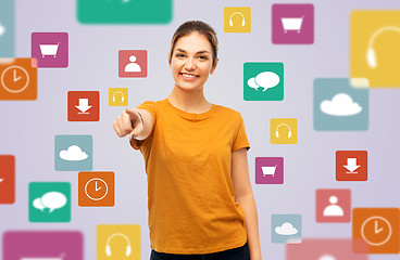 Image showing teenage girl pointing at you over media icons