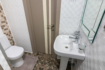 Image showing The interior of a small toilet in the hotel room