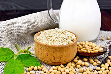 Image showing Flour soy in bowl with soybeans and milk on napkin