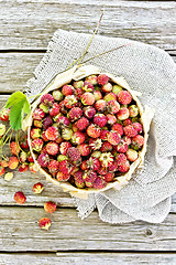 Image showing Strawberries in box on board top