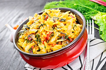 Image showing Cabbage stew with chard in bowl on napkin