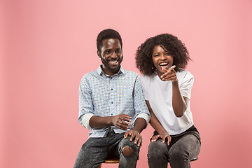 Image showing Couple watching sports match on tv at home, celebrating victory, successful game