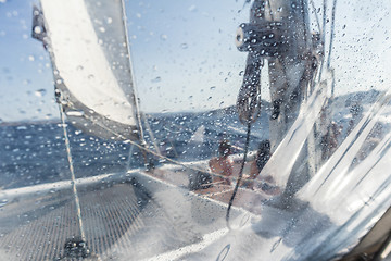 Image showing Sailing yacht catamaran sailing in rough sea. Sailboat. Sailing concept.