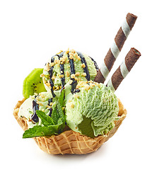 Image showing green ice cream in waffle basket