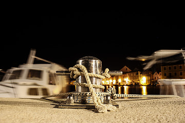Image showing Mooring post at night