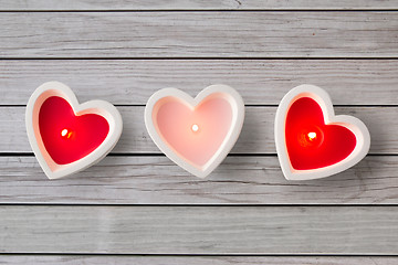 Image showing heart shaped candles burning on valentines day